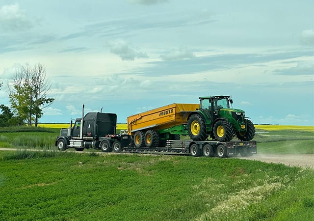 John Deere Tractor being transported