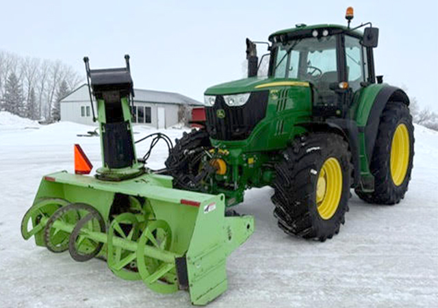 John Deere with snow attachment